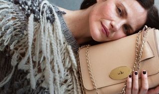 female model resting her face on Medium Lily Crumpet