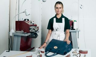 female model resting her face on Medium Lily Crumpet