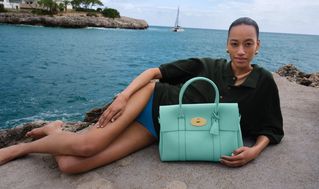 female model resting her face on Medium Lily Crumpet
