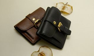 Duo of Mulberry Roxanne wallets in brown and black leather