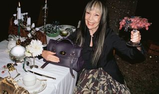 female model hugging aubergine Alexa