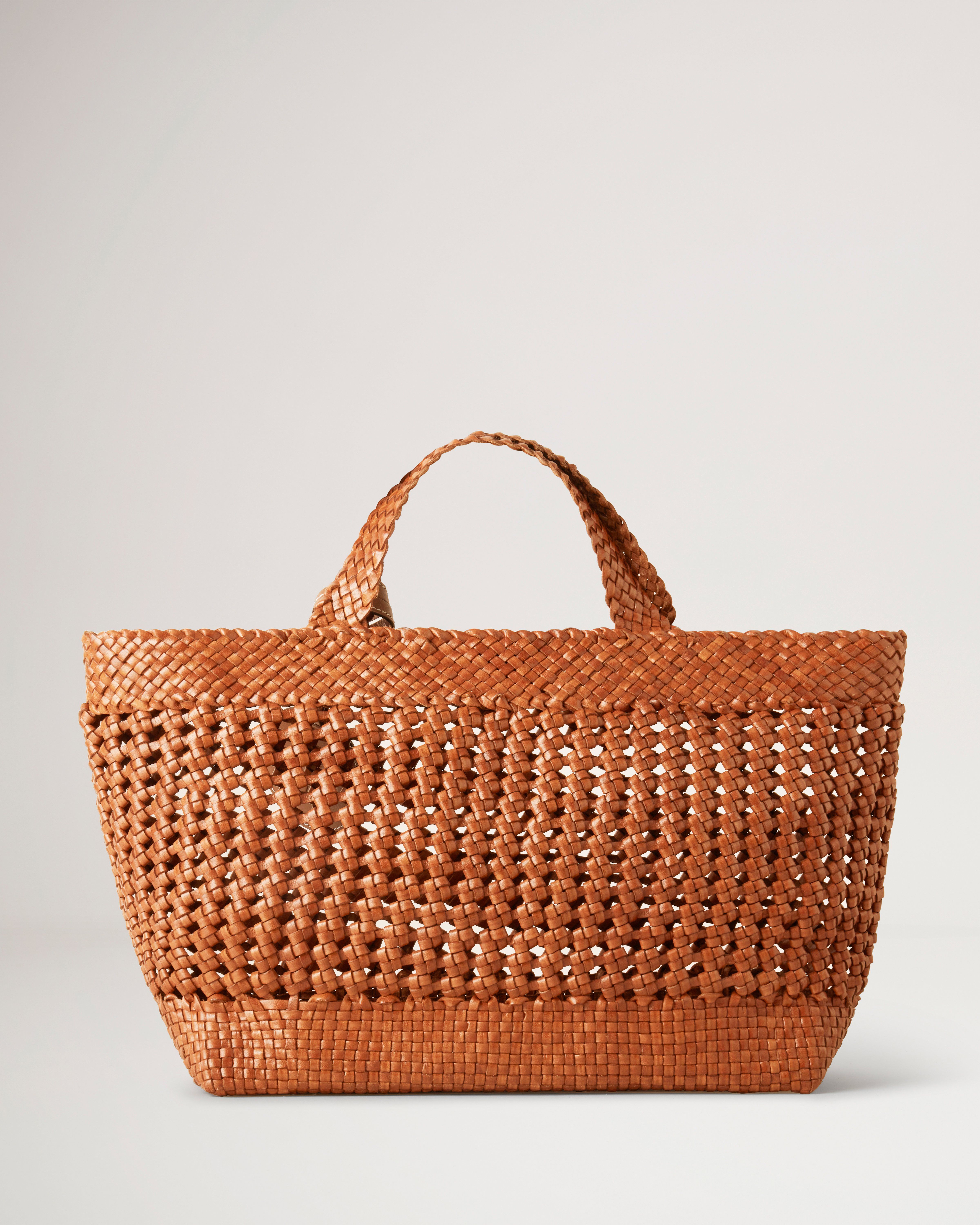 Natural woven leather tote in mint main image 1