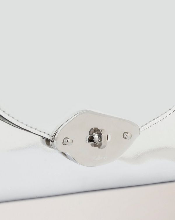 Silver mirror clutch online bag