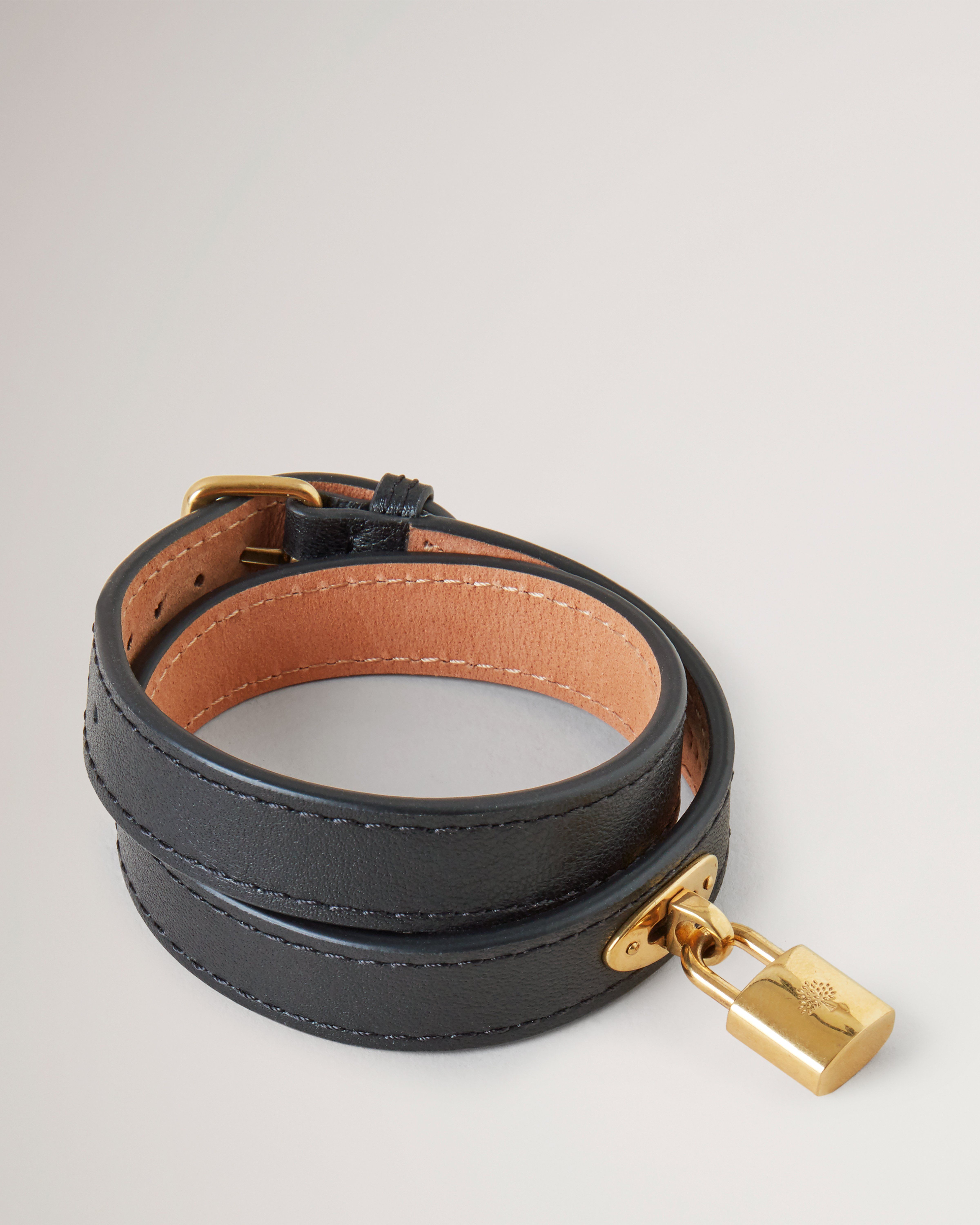 Louis Vuitton Bracelet. Grey and black. Leather. Gold plated lock