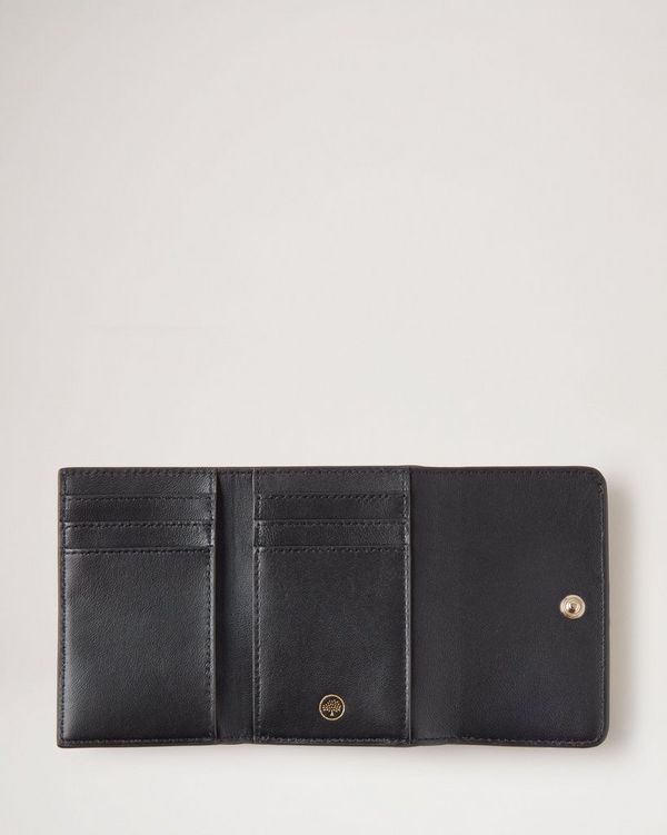 The Monogram Medium Trifold Wallet in Black/White