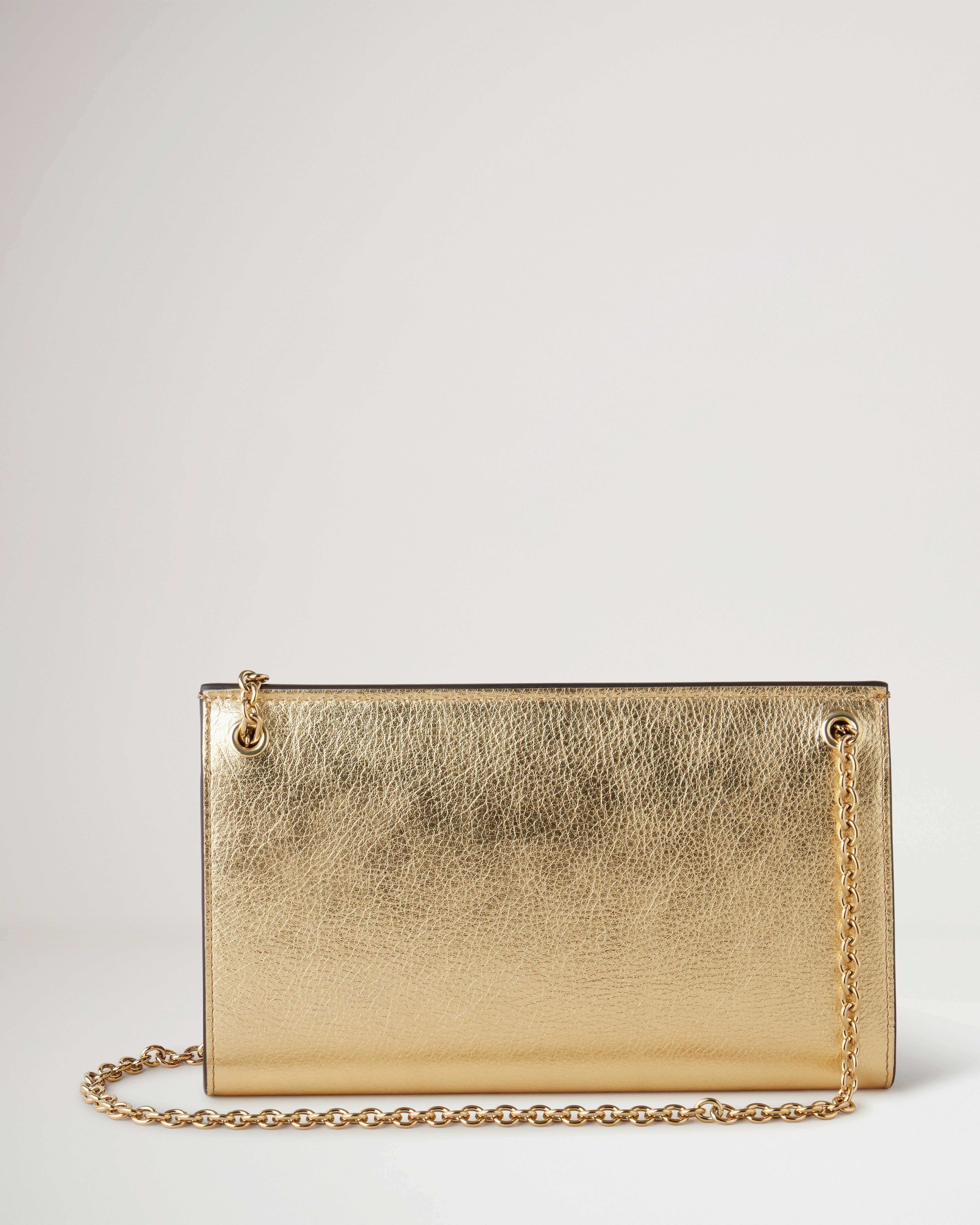 Metallic gold hot sale clutch bag