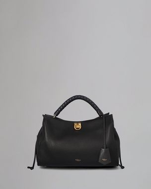 iris-pre-loved-black-heavy-grain