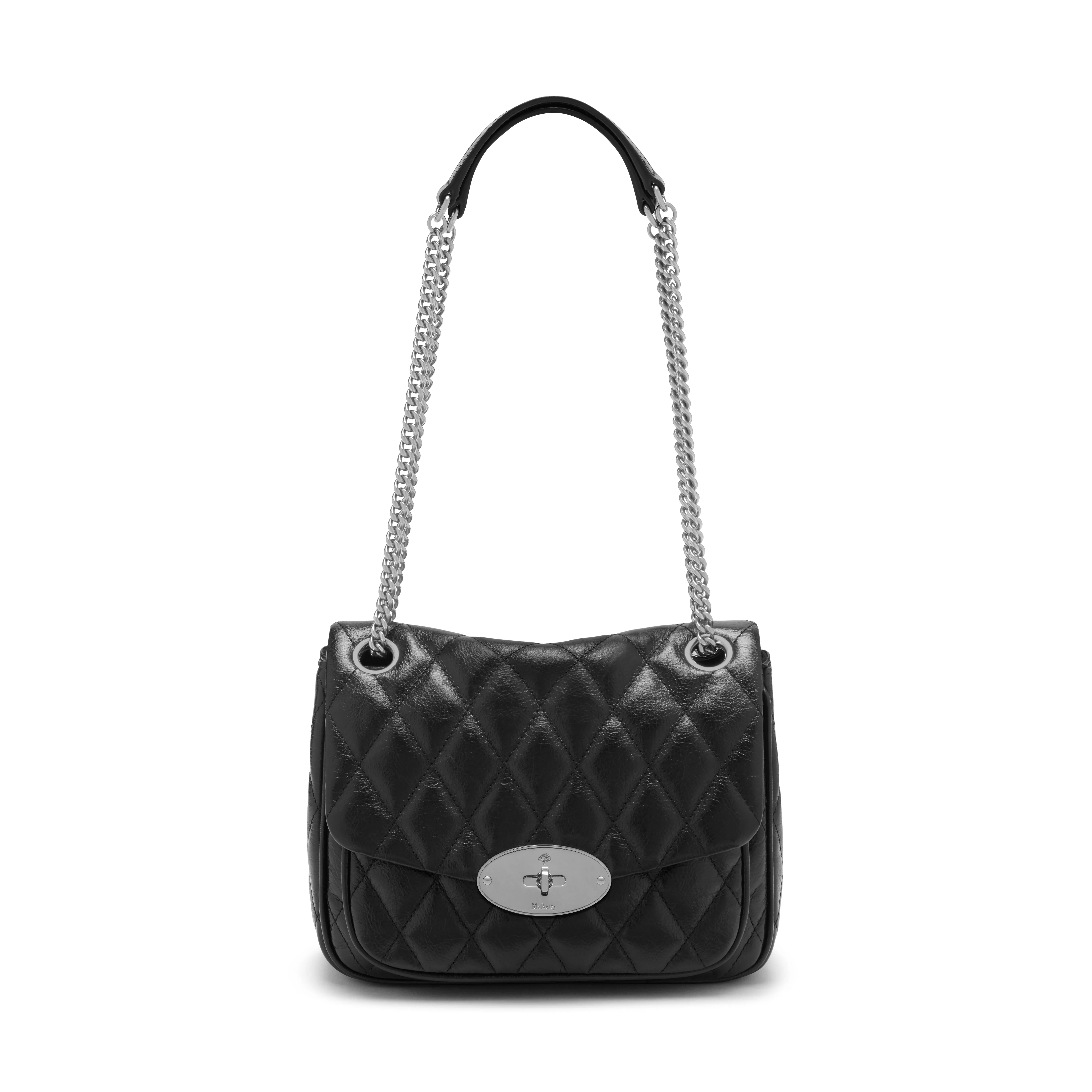 black quilted luggage