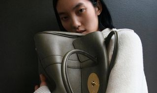 female model hugging Bayswater Juniper Green